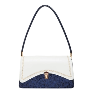 Chic color-block handbag in white and navy blue with shimmering finish and gold buckle