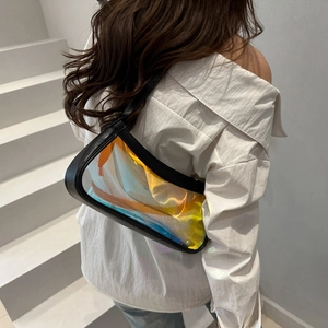 Detailed view of the iridescent holographic shoulder bag with black leather trimming