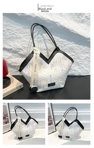 Detailed macro view of geometric quilted tote bag with multi-color wave embroidery