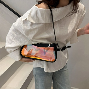 Detail of trendy clear shoulder bag with holographic gradient panel and black leather trim