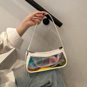 Close-up of stylish white leather baguette bag with iridescent translucent panels