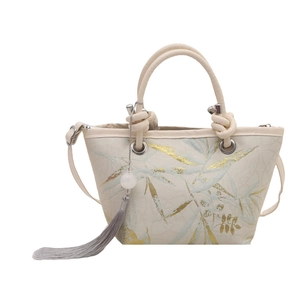 Chinese style bucket bag with green bamboo embroidery and elegant grey silk tassels