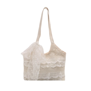 Sac fourre-tout en toile beige avec volants en dentelle blanche et grand nœud décoratif