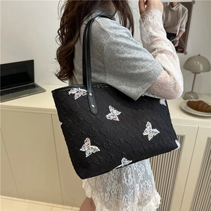 Black large capacity tote bag with butterfly sequin embroidery and quilted E pattern