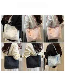 Collage of four jacquard tote bags with butterfly patterns and decorative tassels