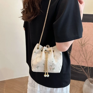 Chic woven lace bucket bag with floral embroidery and pearl drawstring strap for women