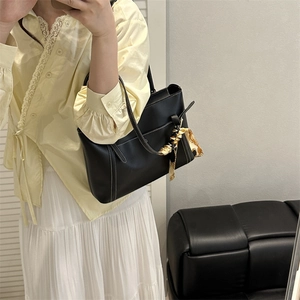 Black PU leather tote bag with silk scarf charm and white stitching for office work