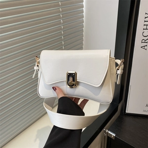 Chic white crossbody bag with gold buckle and wide strap for elegant summer styling