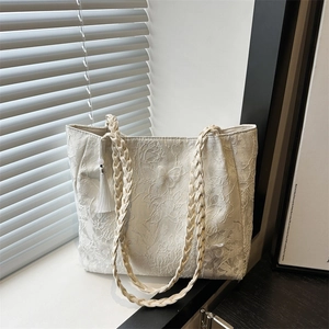 White lace tote bag with butterfly embroidery and woven strap for summer casual style