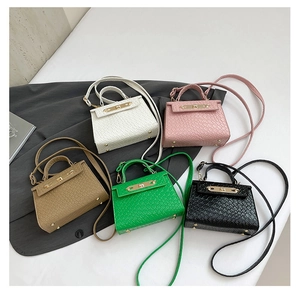 Mini trapezoid bags set in five colors featuring crocodile pattern and metal hardware