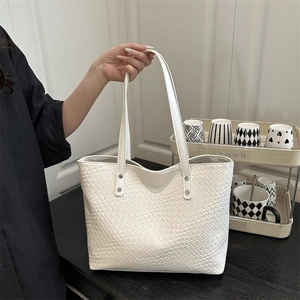 Elegant white woven leather tote bag with large capacity for commuting and daily leisure