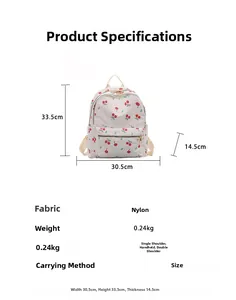 Detailed size specifications of the lightweight cream backpack with red cherry pattern