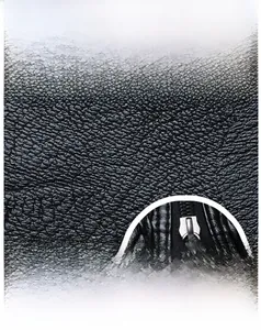 Detail view of black pebble texture leather and durable silver metal zipper on bag
