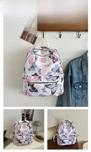 Detail of floral butterfly print backpack with multi-layer zipper and stylish storage