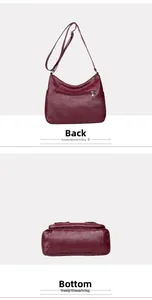 Detail view of the burgundy soft leather crossbody bag showing the back and bottom sections