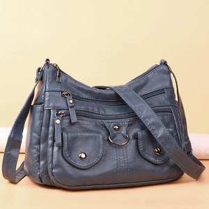 Practical multi-pocket crossbody bag for women in soft blue faux leather material