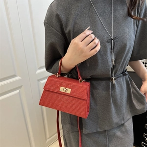 French vintage red glitter Kelly bag with gold twist-lock and slim shoulder strap