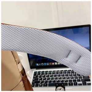Detail of breathable honeycomb mesh shoulder straps on the khaki casual backpack