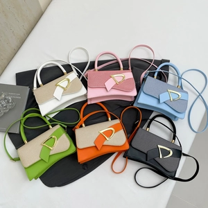 Fashionable crossbody bags with gold D-buckle and bow detail in six vibrant colors