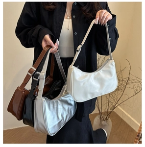 Minimalist crescent hobo bags shown in brown, black, silver, and white color options