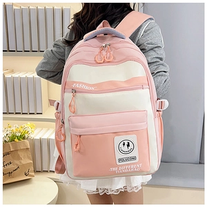 Pink and beige color-block school backpack with large capacity shown on a model