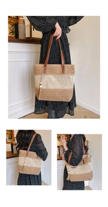 Detail of striped straw tote bag featuring brown leather straps and beaded tassel charm