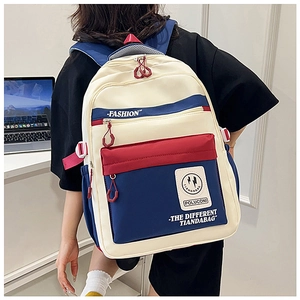 Detail of color-block backpack with multi-pocket zipper design and adjustable side straps