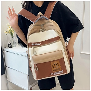 Detail of color-block backpack with multi-zipper pockets and durable nylon fabric