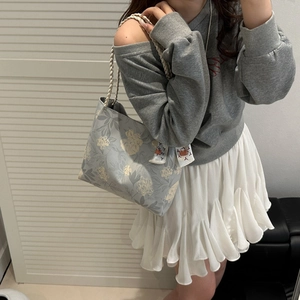 Women's large floral canvas tote bag with braided cotton handles for summer casual use