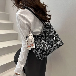 Ethnic style black large capacity tote bag with white geometric patterns and silk scarf