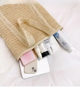 Top view of spacious straw tote bag interior showing large capacity for daily essentials