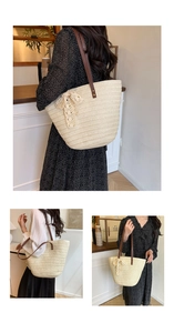 Close-up of beige woven tote bag with brown leather straps and lace bow detail