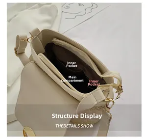 Detail view of woven straw bucket bag interior with large main pocket and side slots