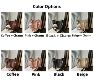 Detail view of large tote bags in four colors with chain straps and cloud charms