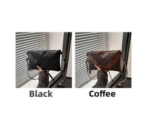Detail view of rivet envelope handbags in black and coffee colors with V-pattern