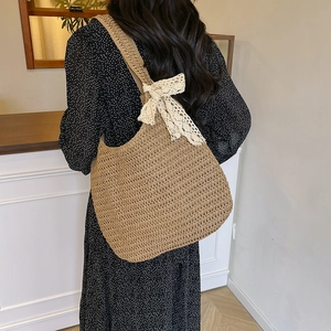 Large woven tote beach bag for women with elegant cream lace bow shoulder straps