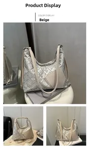 Detailed close-up of beige jacquard embroidery and leather texture on a hobo shoulder bag