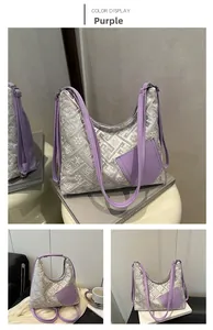 Detail of silver-grey floral jacquard fabric and purple PU trim on a shoulder tote bag