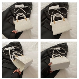 Detailed views of a white embossed PU leather crossbody bag with golden hardware details