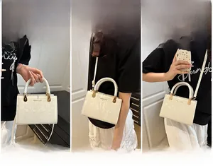 Three ways to wear this white faux stone textured crossbody bag with woven handle details