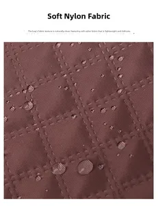 Macro detail of brown quilted nylon fabric showing waterproof surface and water droplets