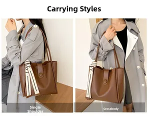 Detail view of brown tote bag with silk scarf handle showing shoulder and crossbody carry