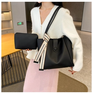 Chic black large capacity tote bag and clutch set with decorative silk scarf on shoulder strap
