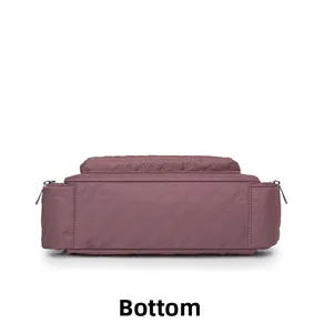 Detailed bottom view of large nylon crossbody bag with quilted diamond pattern