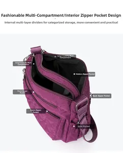 Detailed view of purple nylon shoulder bag with heart quilting and multi-pocket layout
