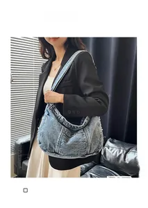 Retro washed denim hobo bag featuring large capacity and adjustable crossbody strap