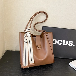 Brown PU leather tote bag with elegant LOVE print silk scarf and metal feet on base