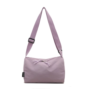 Large lavender purple crossbody bag with adjustable strap and casual nylon fabric texture