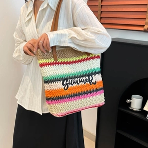 Colorful striped straw tote bag with Summer embroidery and leather handles for beach