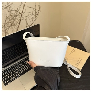 Chic white PU leather bucket bag with Fanyissa embossed logo and slim shoulder strap